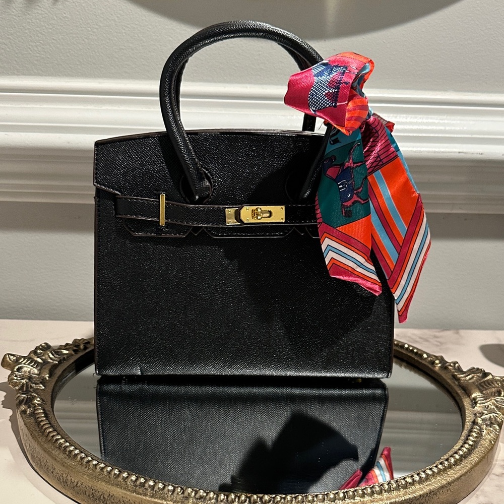 Fashionable Black Handbag with Colorful Accents